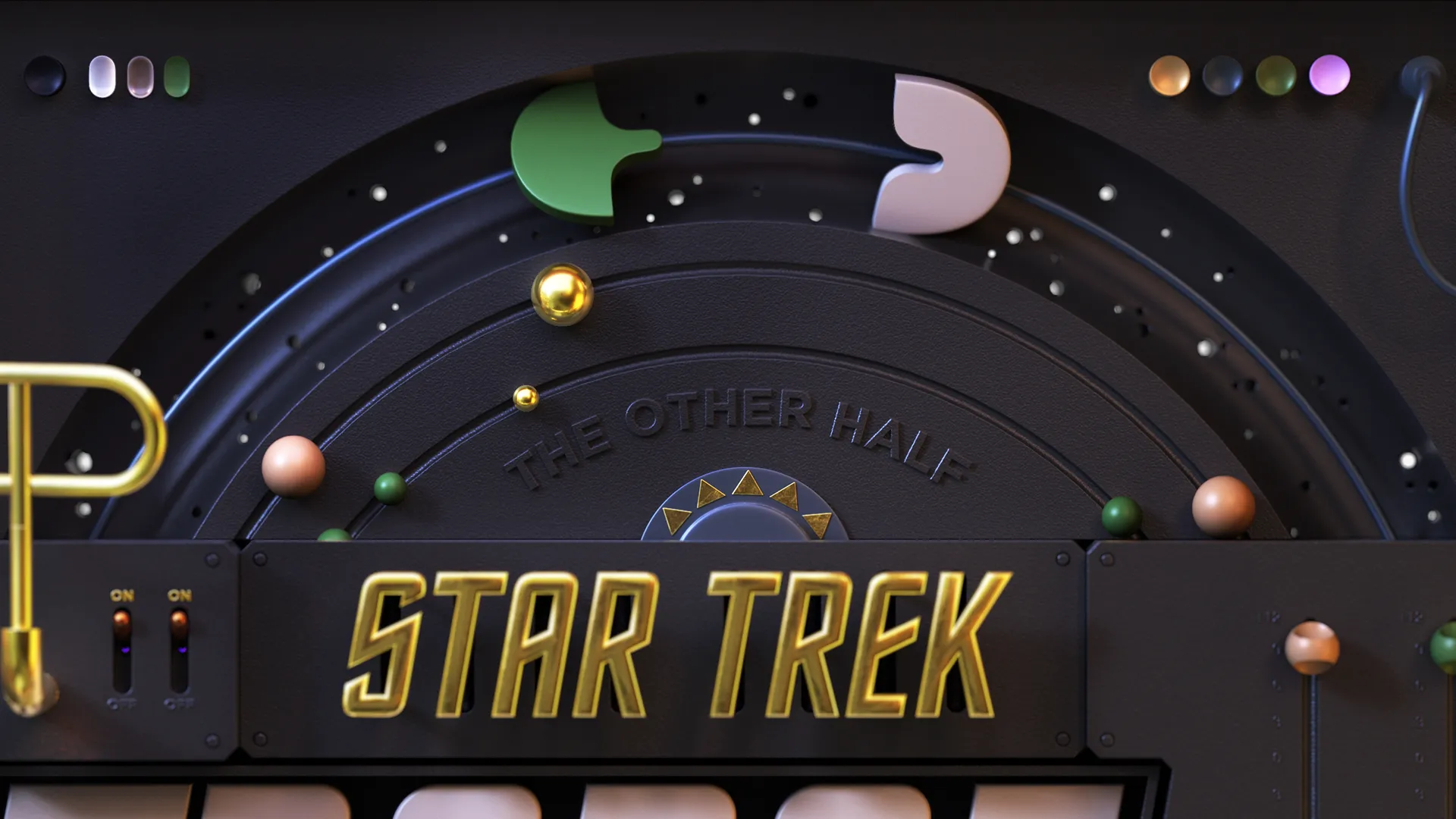 Star_Trek_Stills17 Close-up of the Star Trek logo and circular mechanical elements with metallic details and colored spheres.